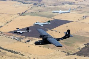 The RAAF’s first P-8A Poseidon flies in formation with a current AP-3C Orion and past No 11 Squadron aircraft including the Lockheed Neptune and Catalina. Photo courtesy RAAF.